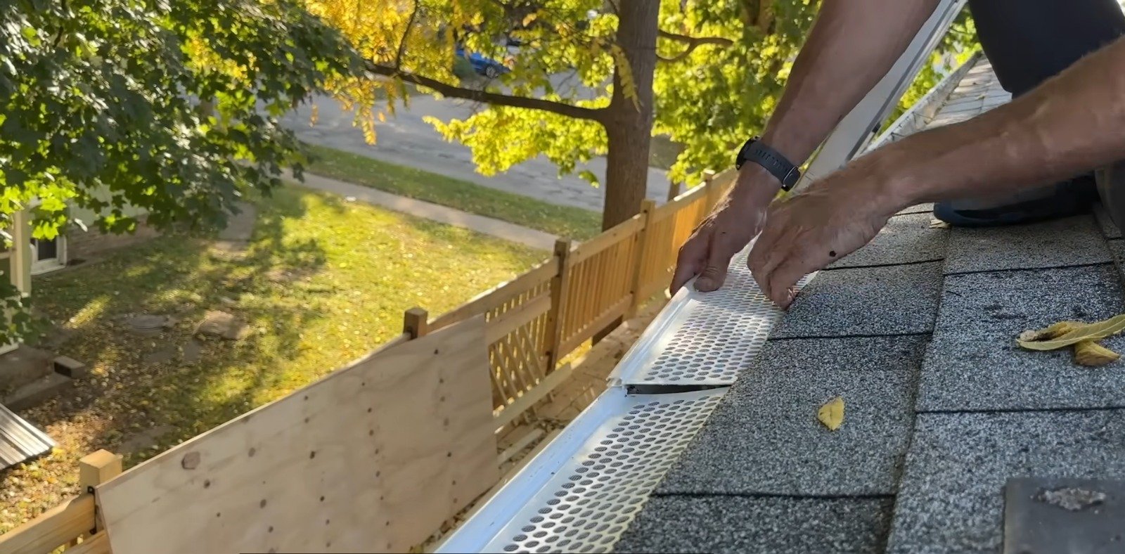 Clean, hand-cleared gutter after cleaning on a Clarence, NY property