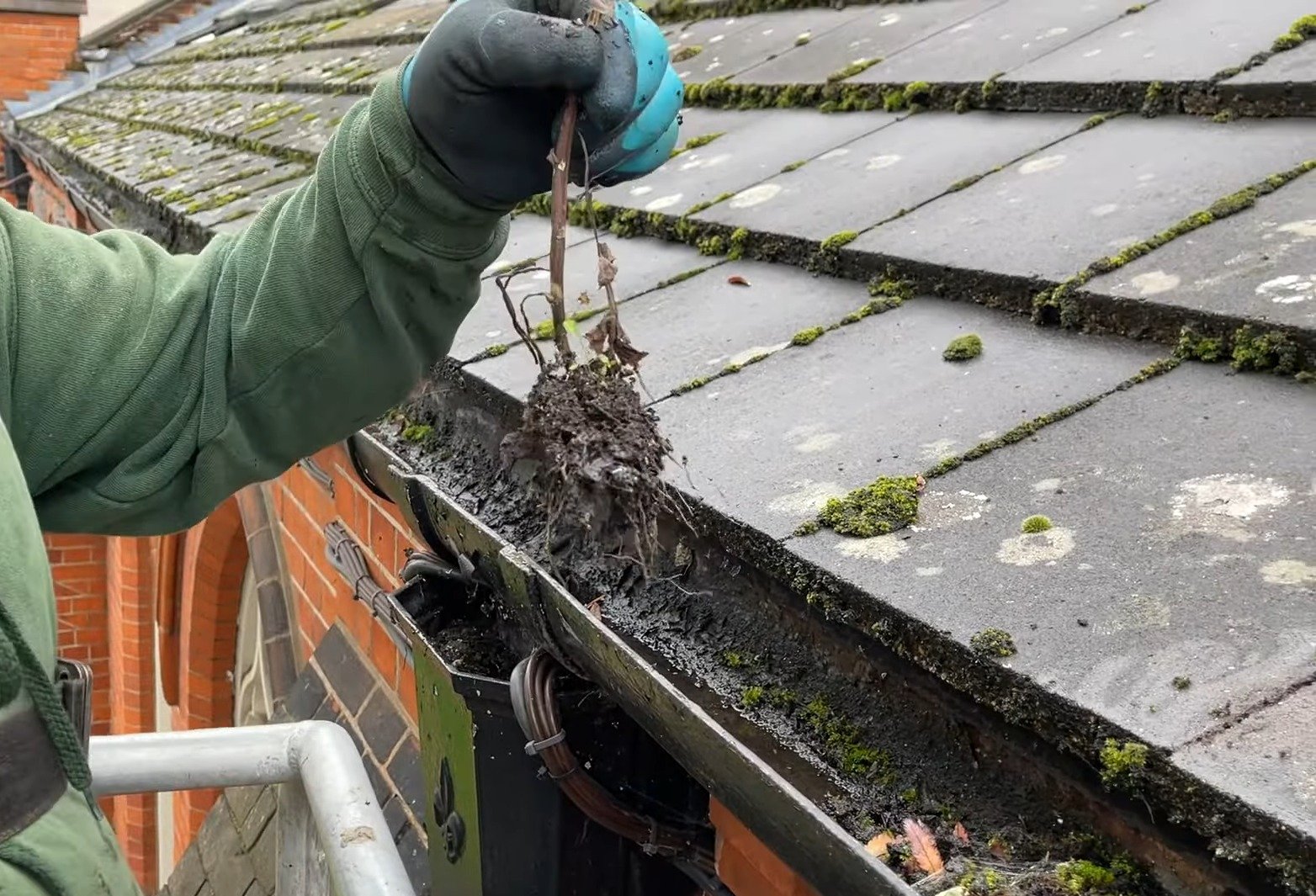 Clean, hand-cleared gutter after cleaning on a Tonawanda, NY property